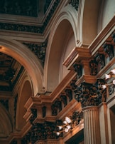 Historic architectural details in bordeaux tones, evoking timeless elegance and tradition.