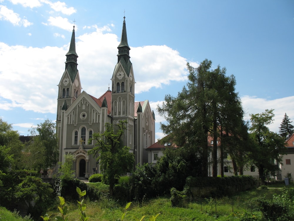 gray Gothic cathedral under cumulus clouds