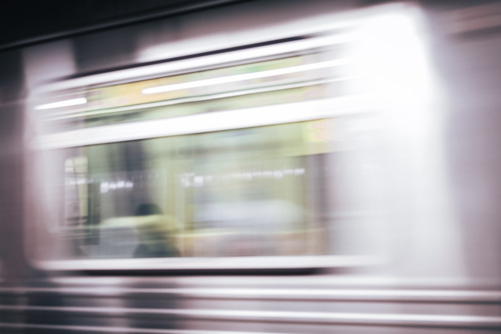 a blurry photo of a subway train