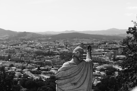 A thoughtful guardian figure overlooking a digital cityscape representing transparency and oversight.