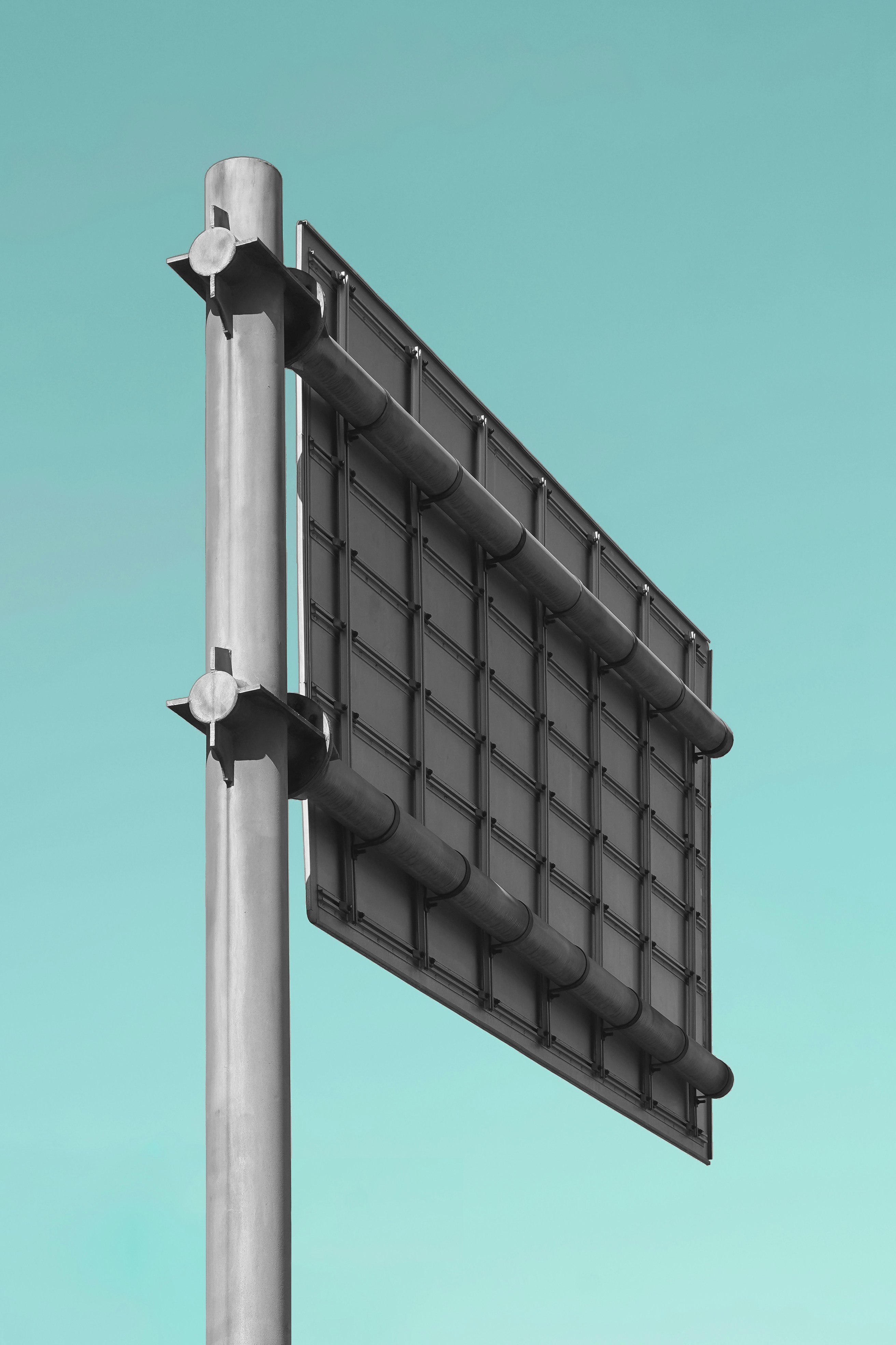 gray metal signboard during daytime