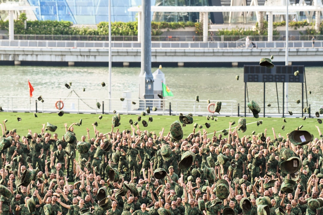 crowd on green field