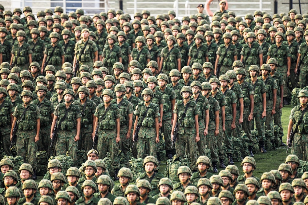 soldiers on field at daytime