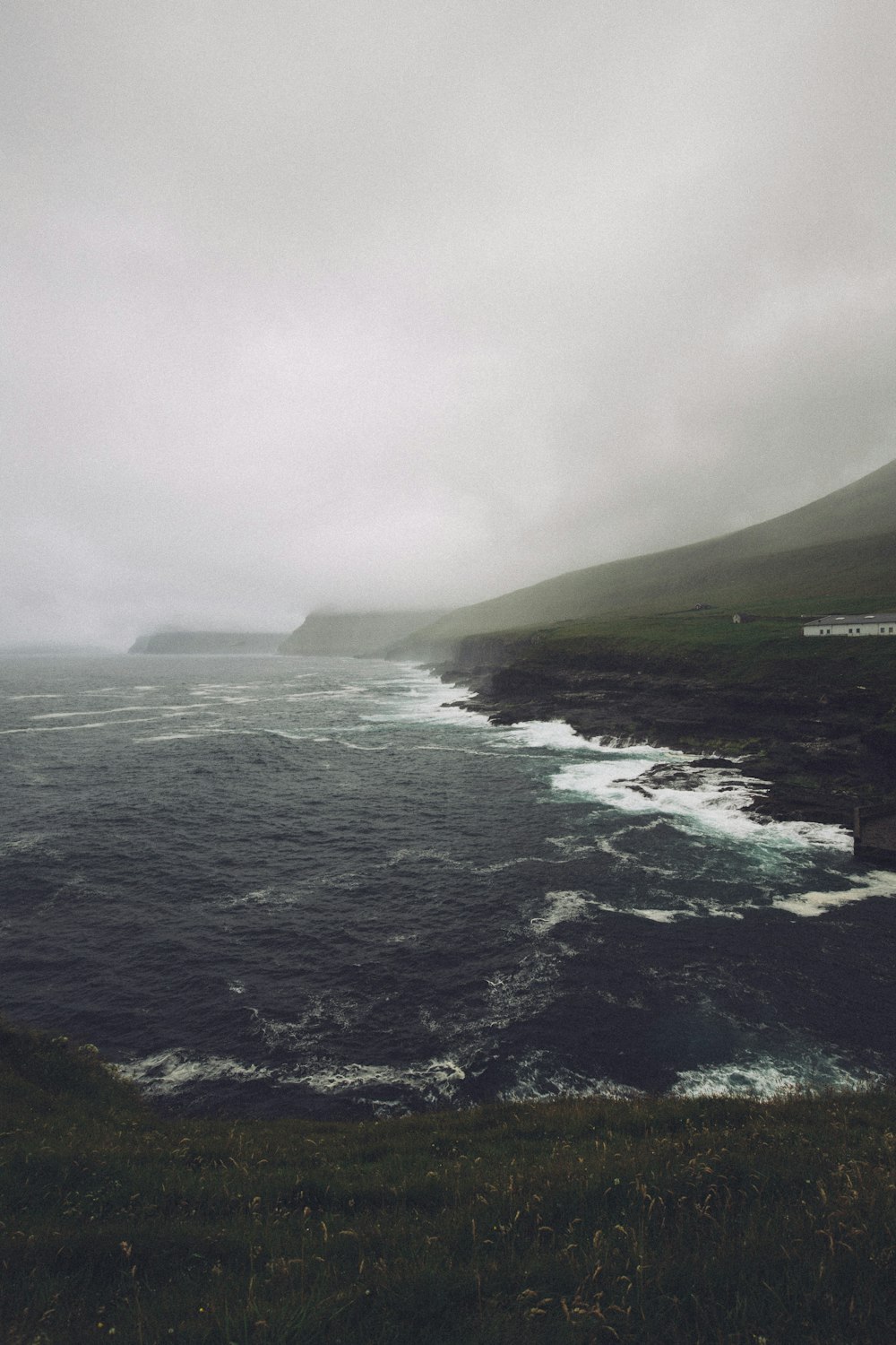 ocean near mountain