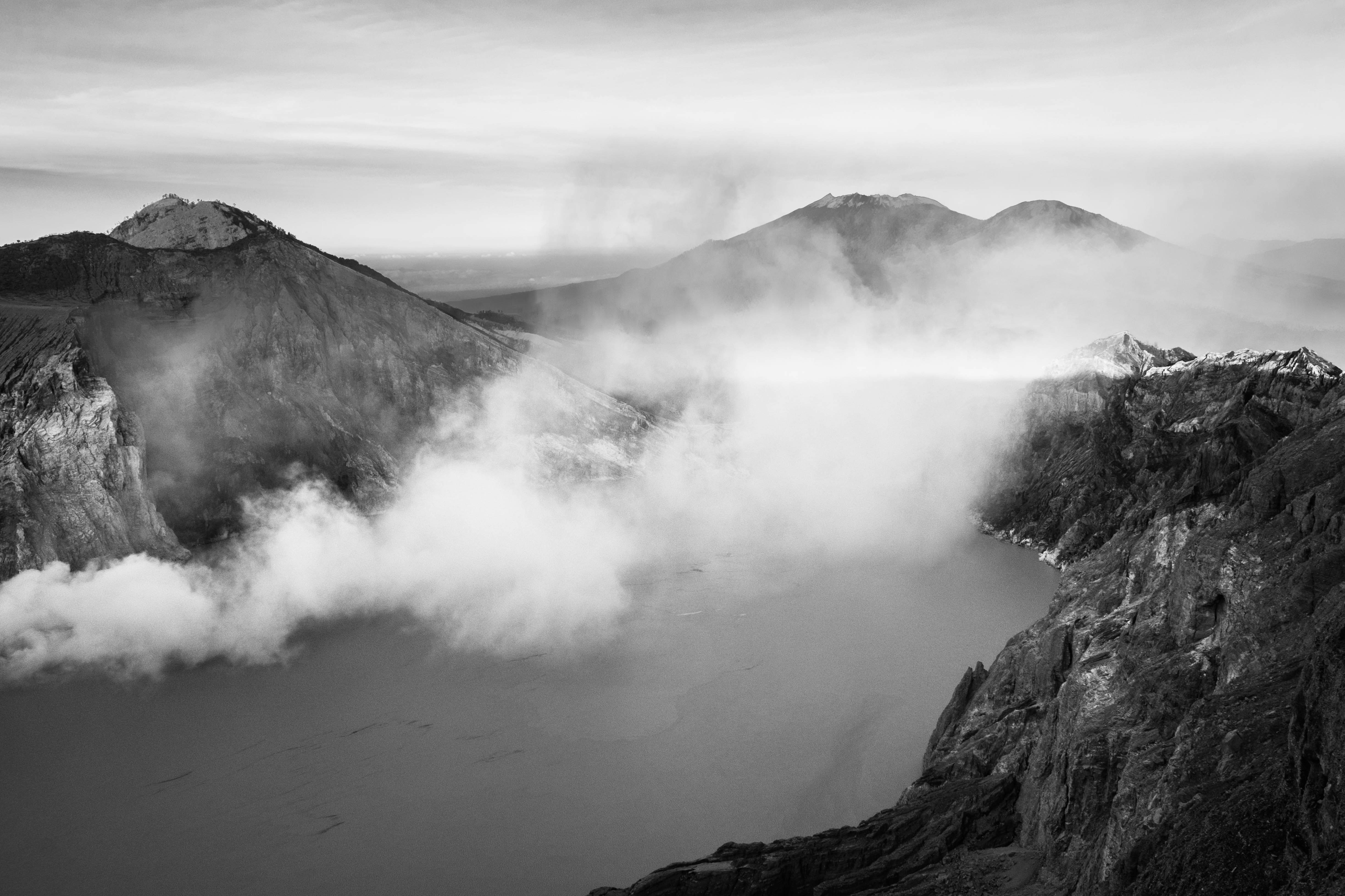 greyscale photo of mountains