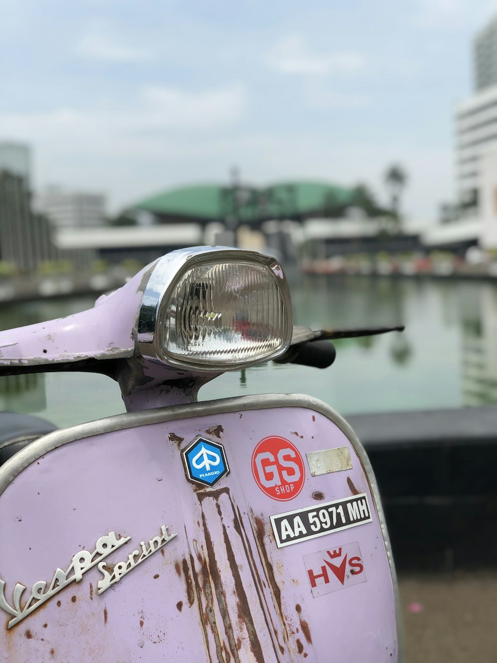 selective focus photography of white motor scooter