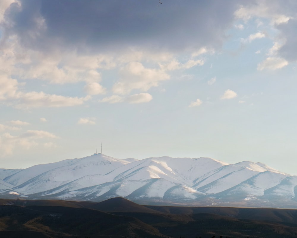 mountain covered by snow