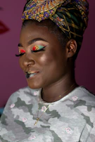 An artistic shot of an elaborate headwrap featuring bold, unconventional designs.