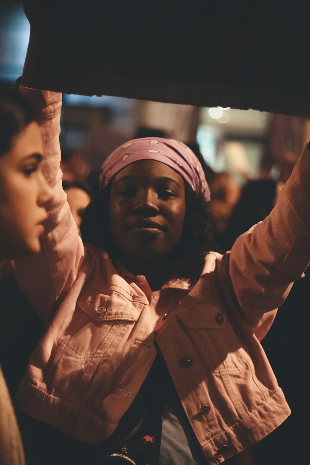 woman raising hands photo