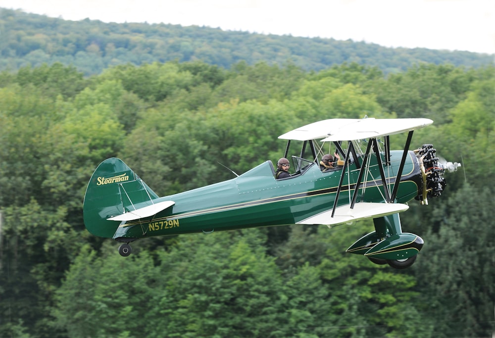 green biplane