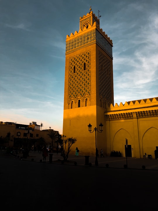 black lamp post near brown building in Saadiens Tombs Morocco