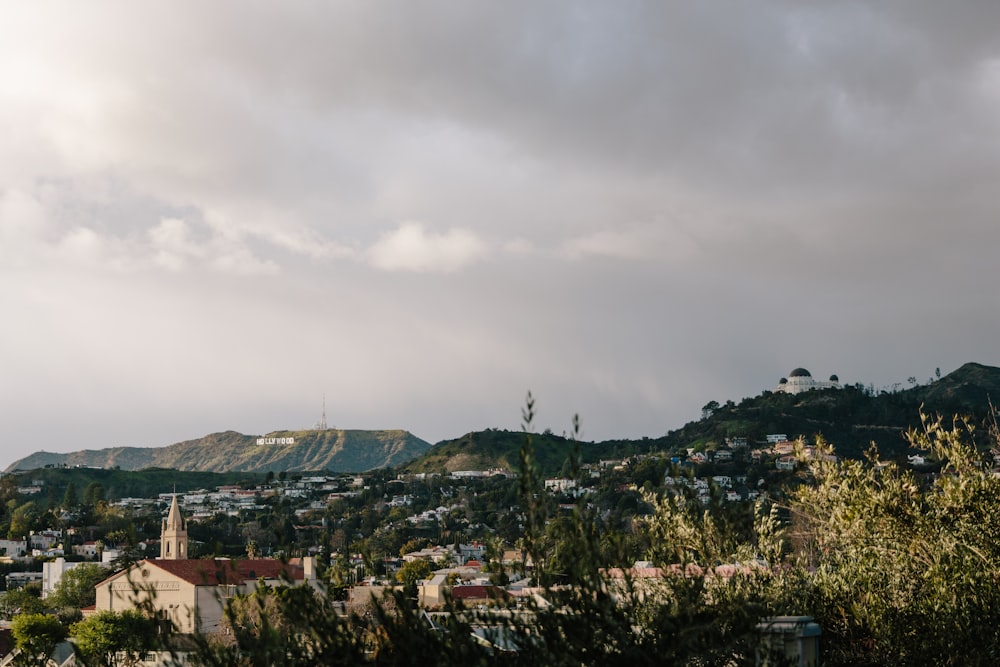 a view of a city with a mountain in the background