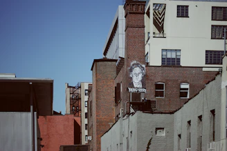 A cool street-style portrait of yungbprods with the Sunshine Coast skyline in the background.