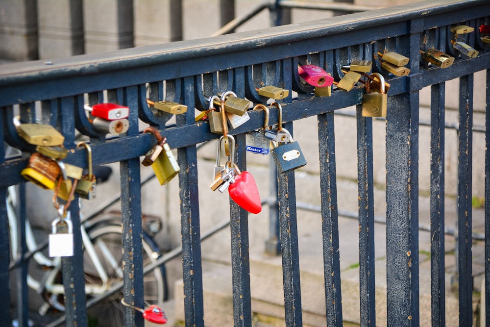 padlocks on black metal railings