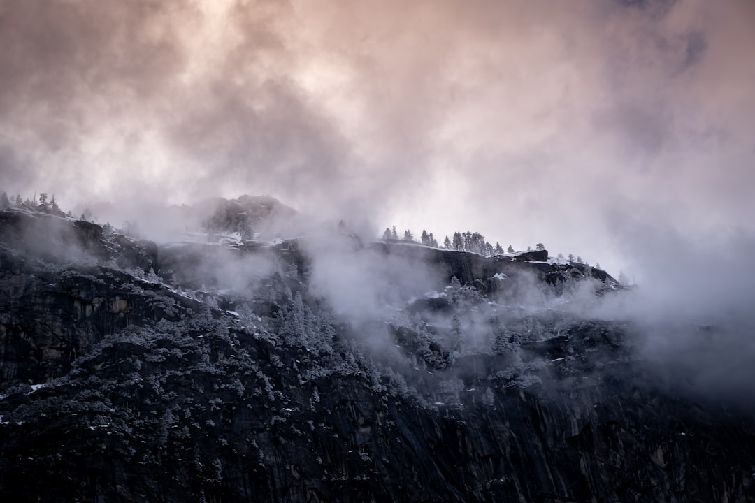 rock mountain with fog
