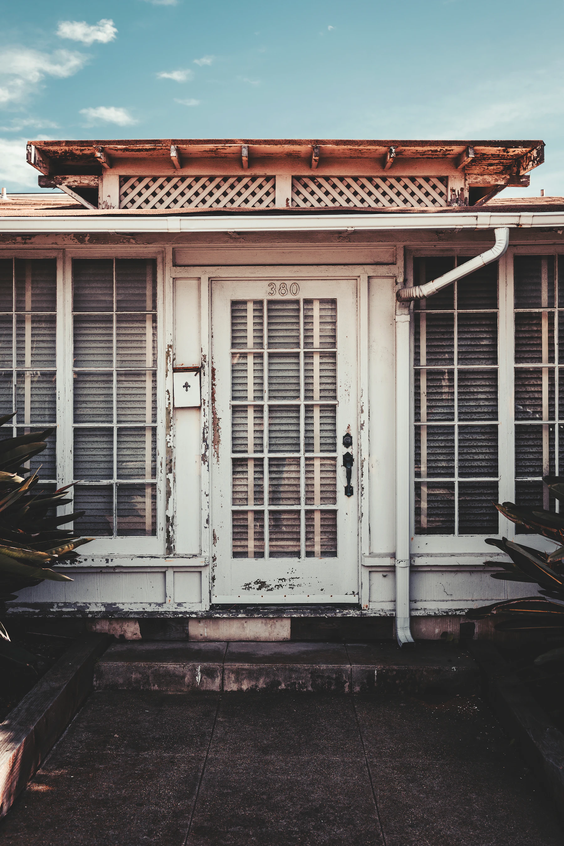 Suburban home behind a walled boundary