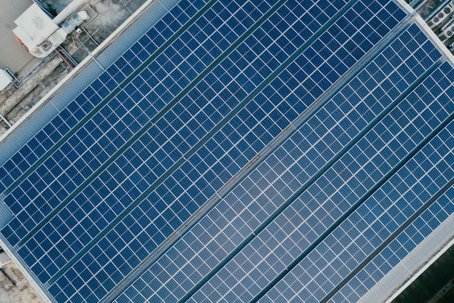 Aerial view of solar panels on a rooftop.