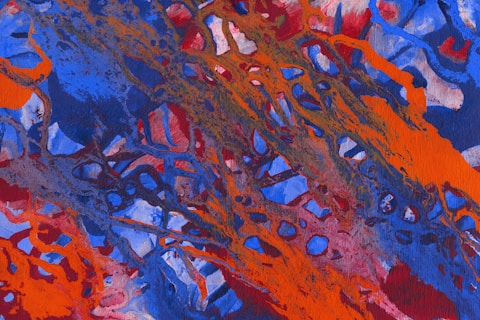 A vibrant abstract painting with intense colors and dynamic brush strokes creating a sense of movement. The composition is dominated by bold patches of blue and orange intertwined with accents of red and brown, giving it a dramatic and energetic feel.