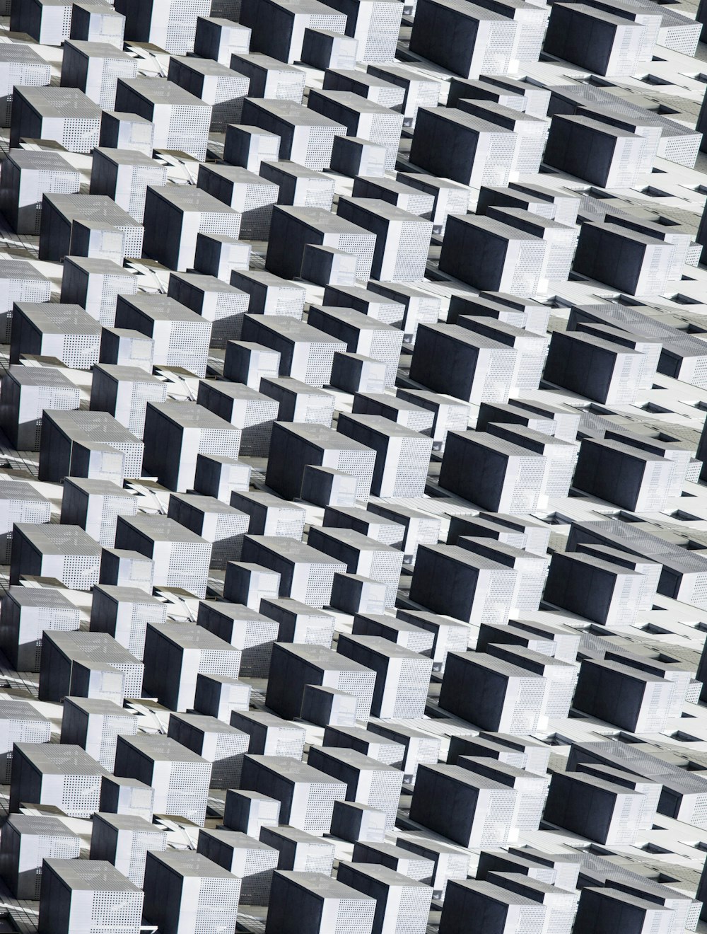 a black and white photo of a pattern of cubes