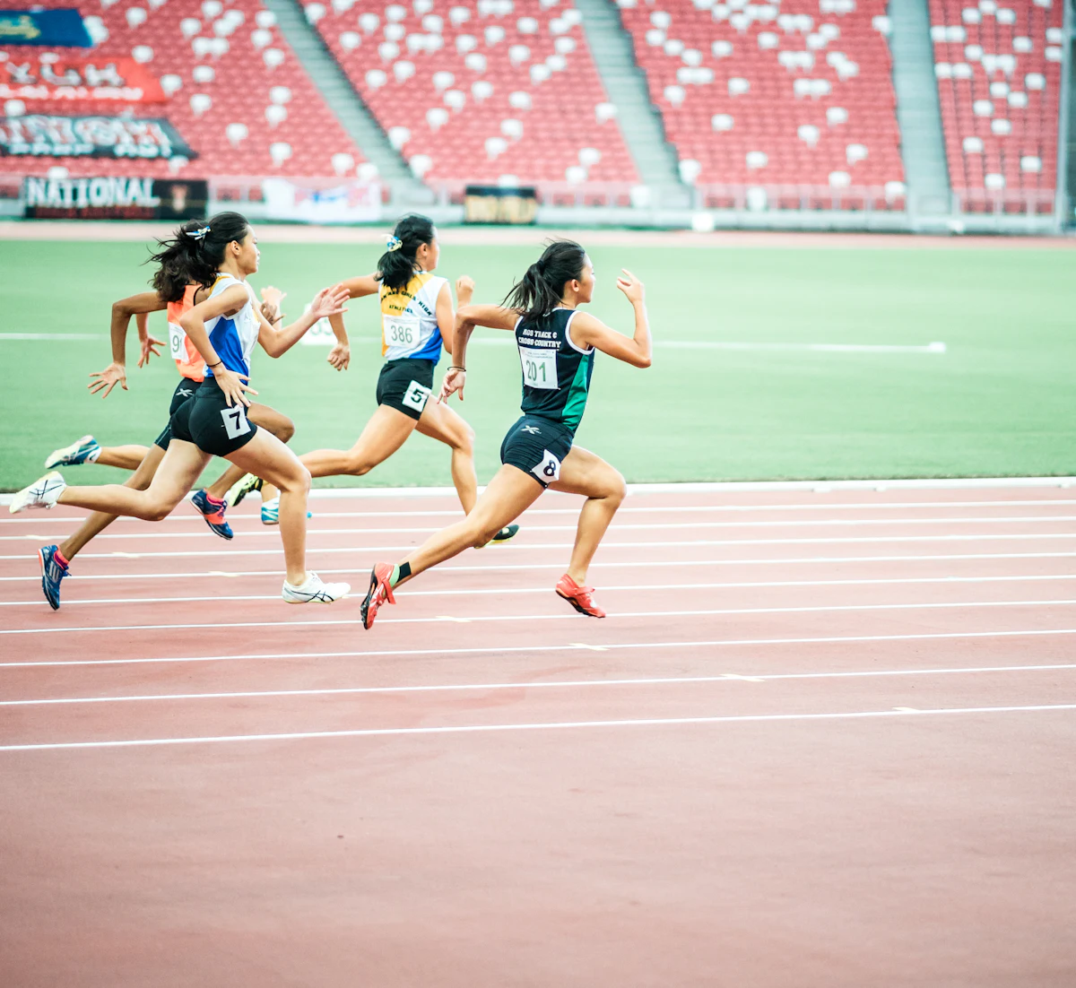 Runners racing on a track