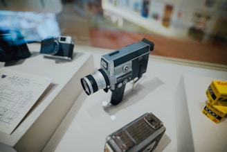 black and grey classic camera on table