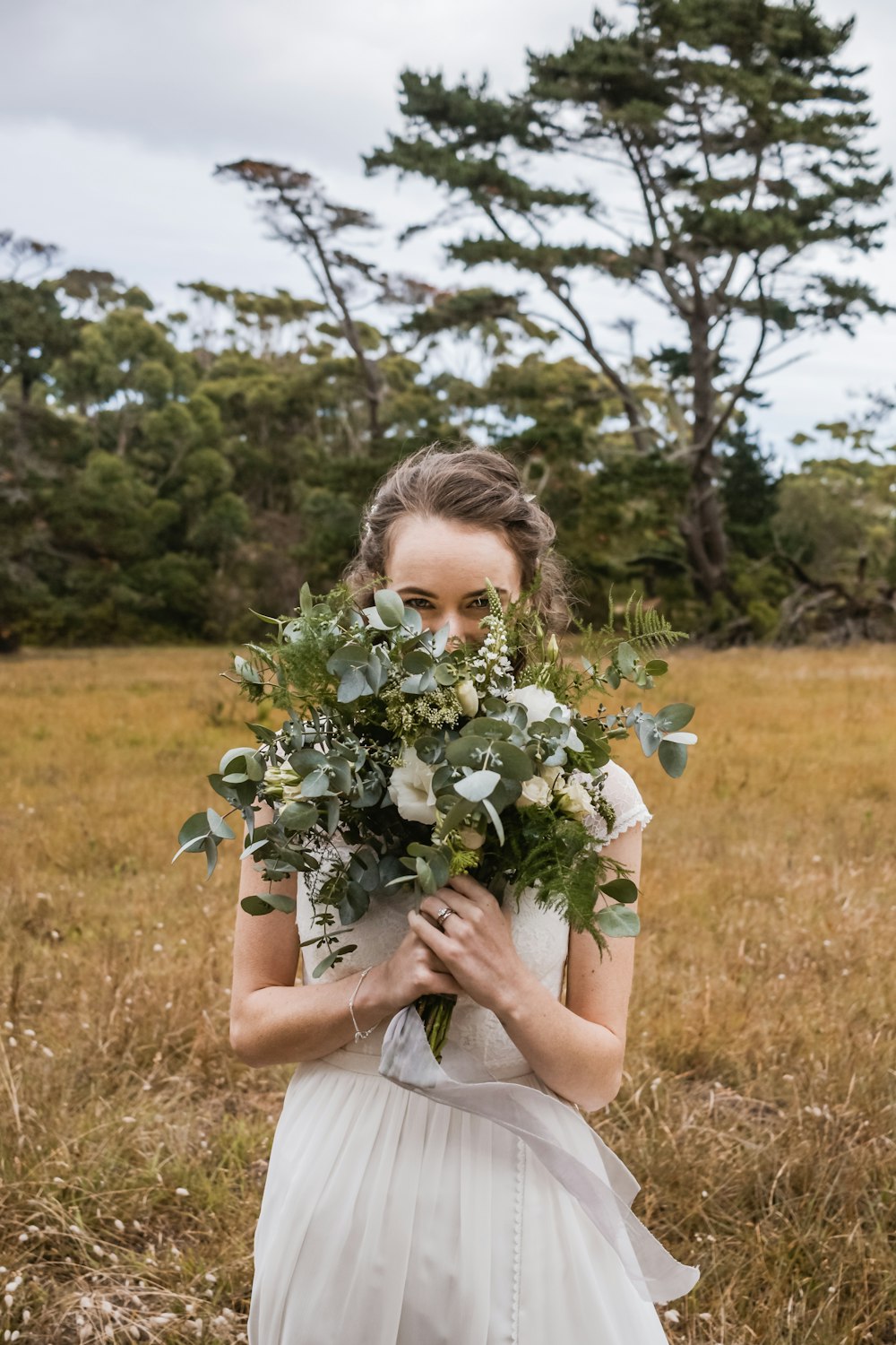 woman wearing white flowers