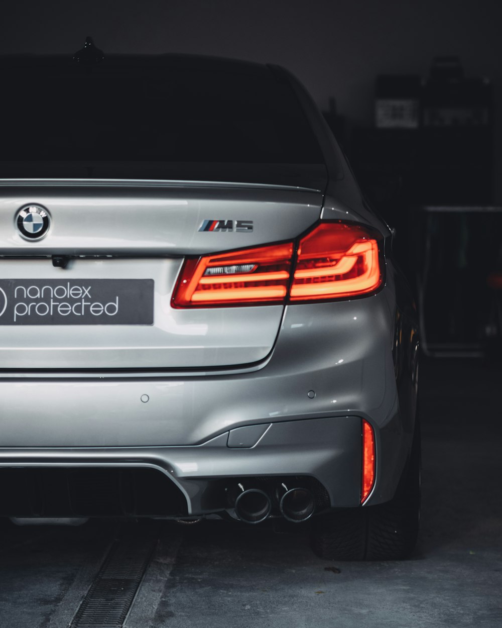 grey BMW M5 sedan