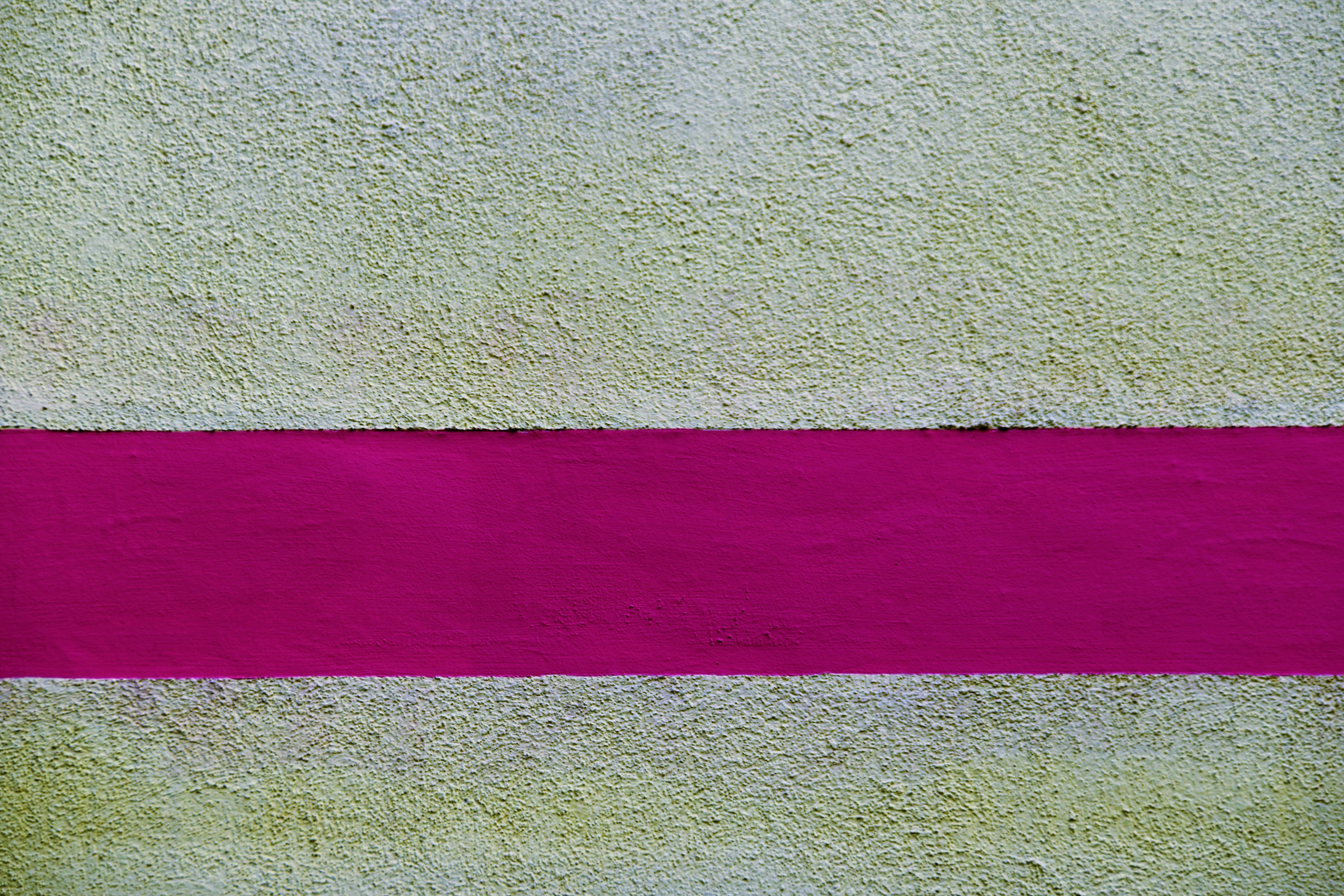 pink textile on beige surface