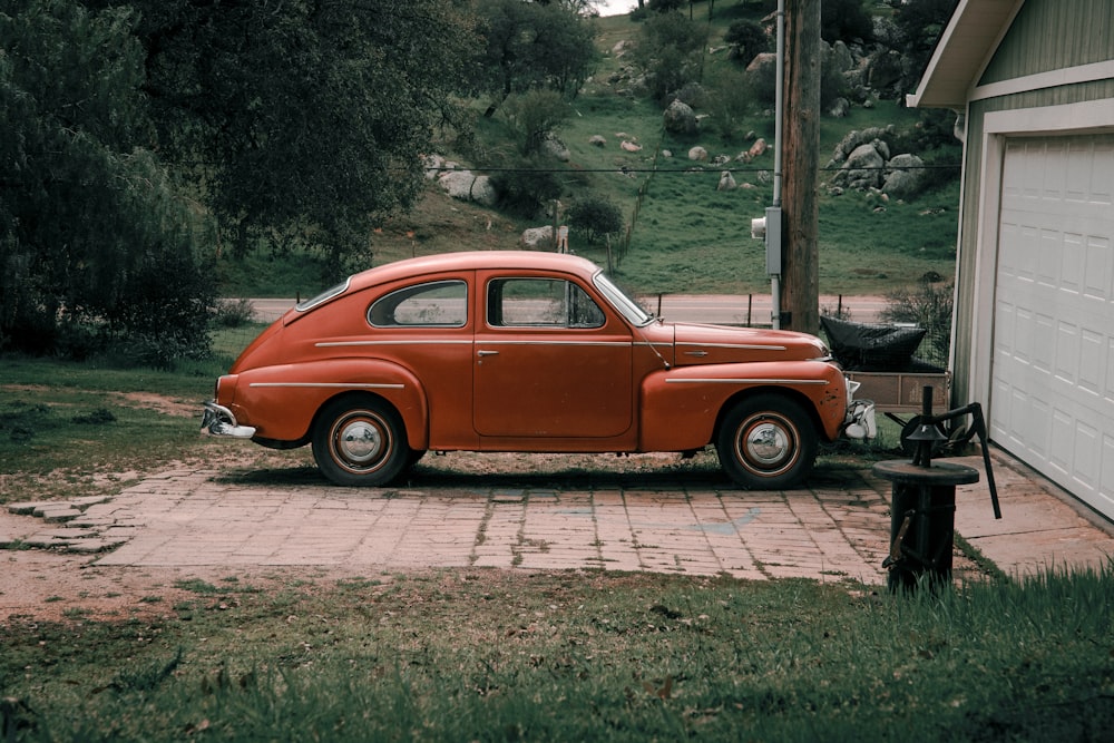 parked orange coupe