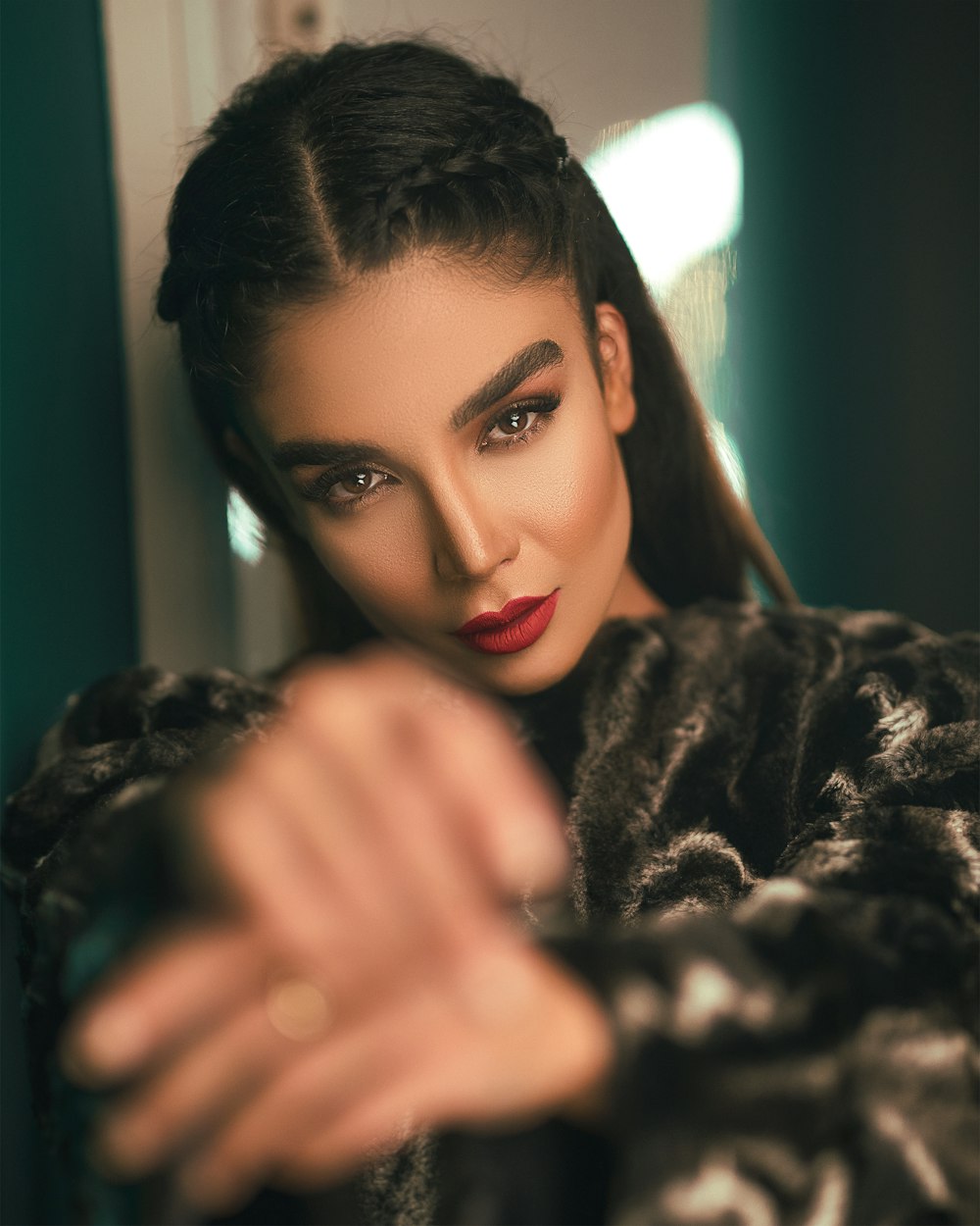 woman wearing black and gray fur coat