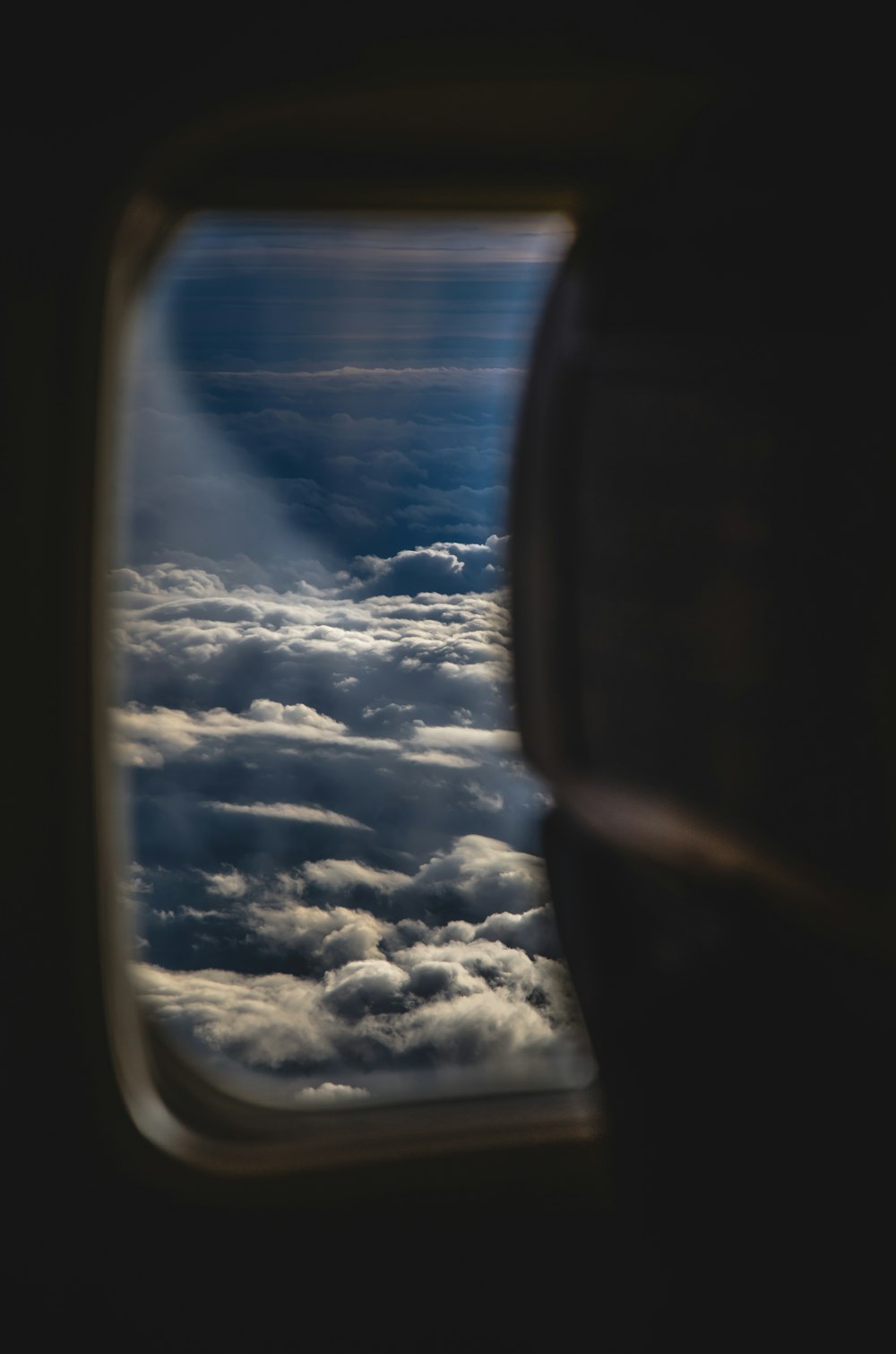 a view of the clouds from an airplane window