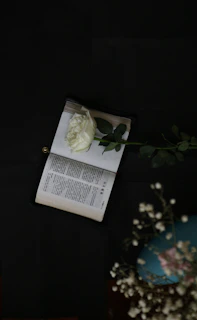 white flower on book