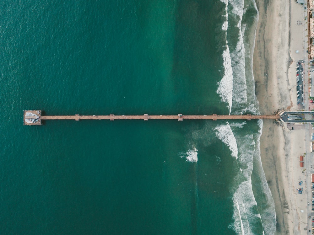 brown wooden dock aerial view