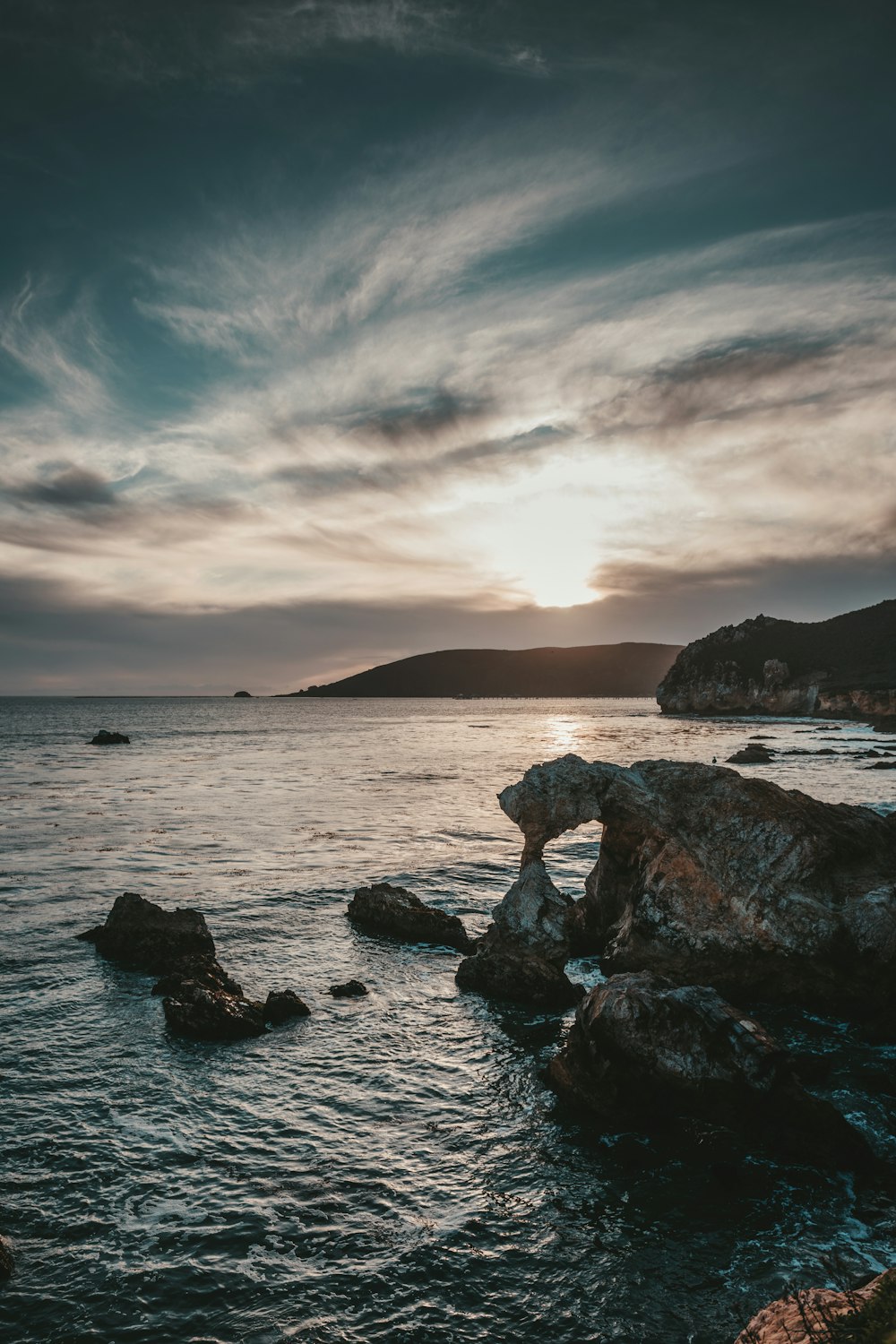 rock near body of water