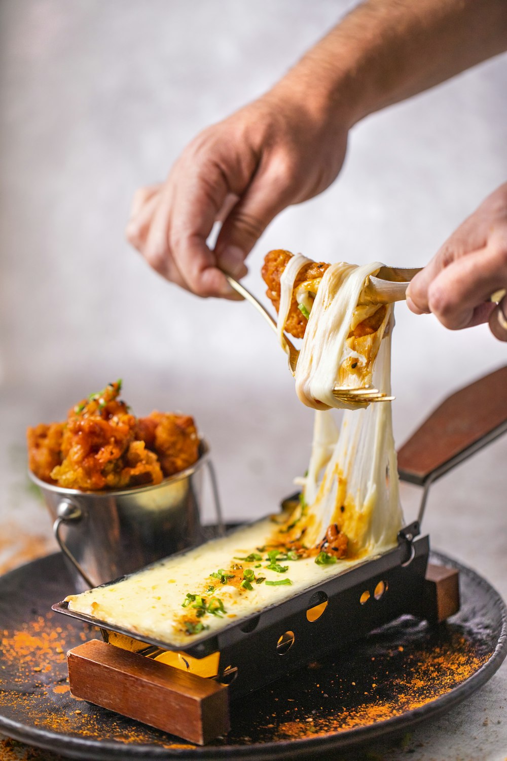 person holding stainless steel fork