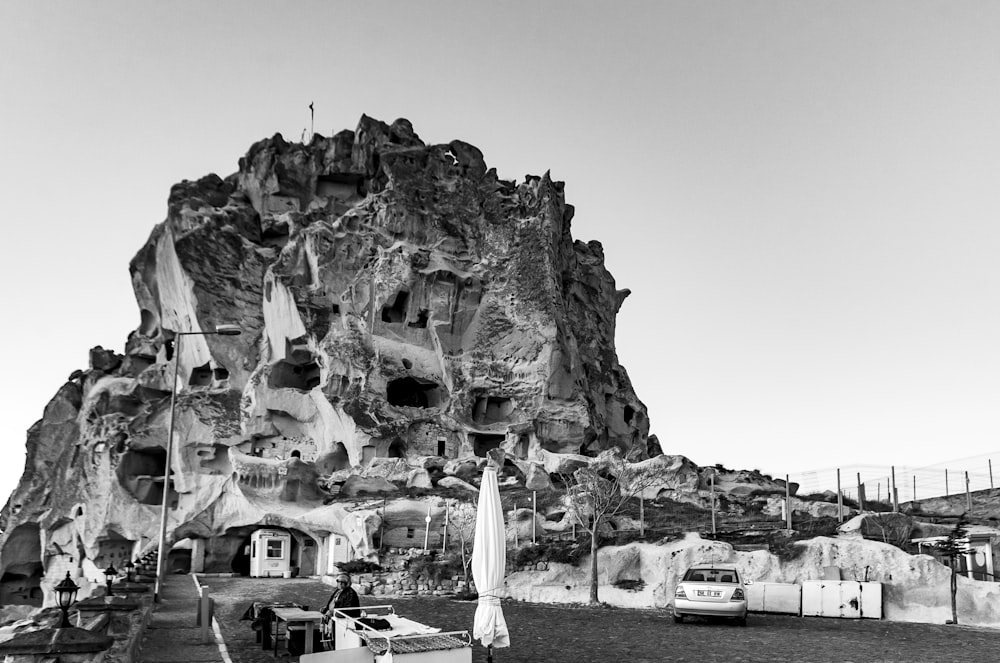 a black and white photo of a rock formation