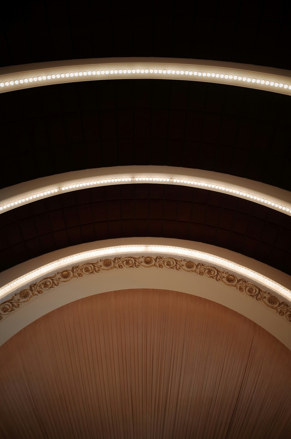a view of the ceiling of a building at night