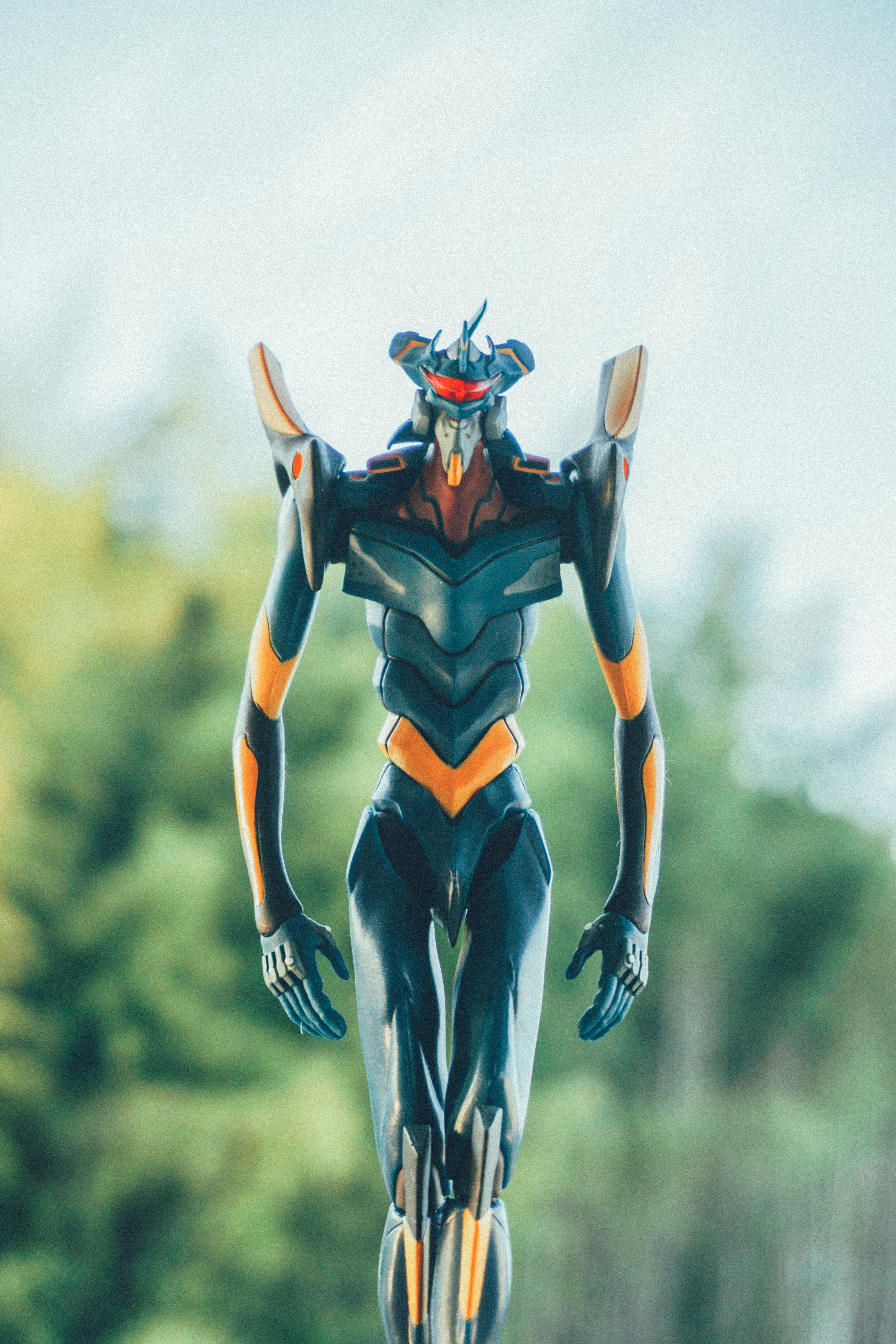 grey and orange robot character