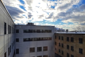 The exterior view of Dnyaneshwari Shikshan building on a sunny day