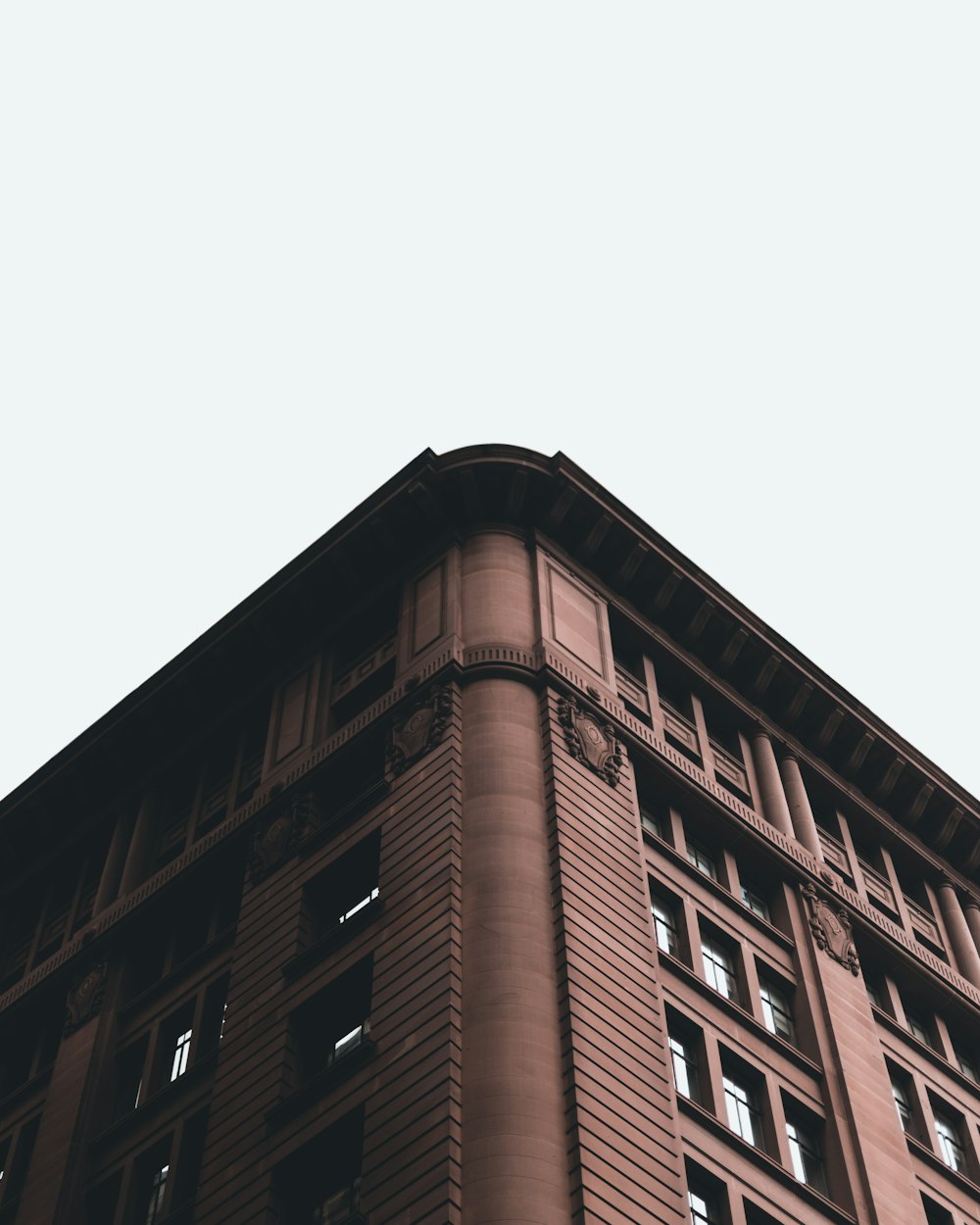 a tall building with a clock on the top of it