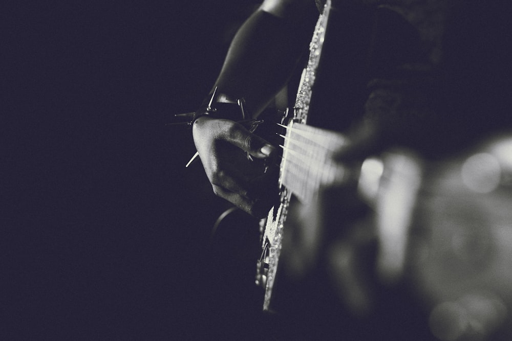 person playing guitar