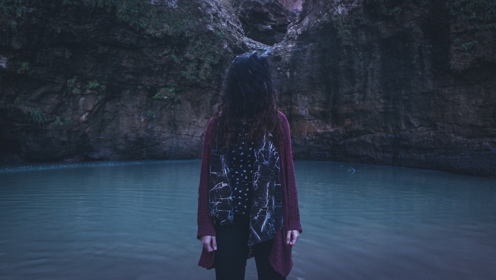 woman wearing maroon cardigan