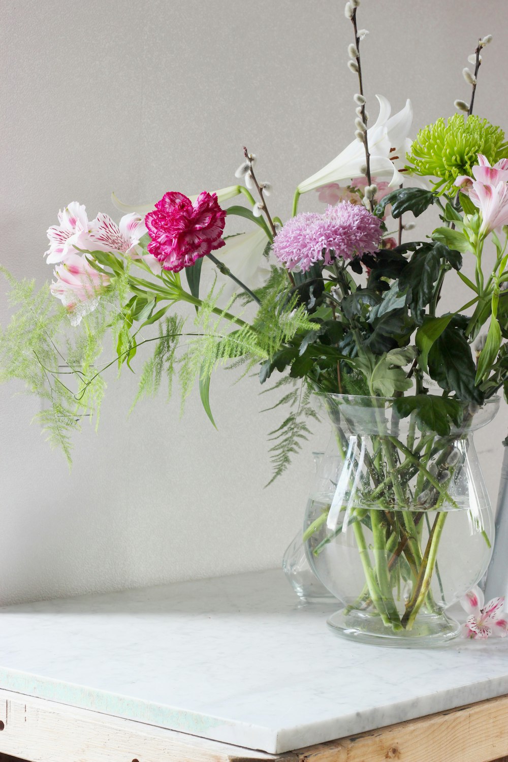 assorted-color flowers in vase