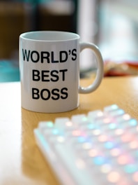 white mug on brown surface