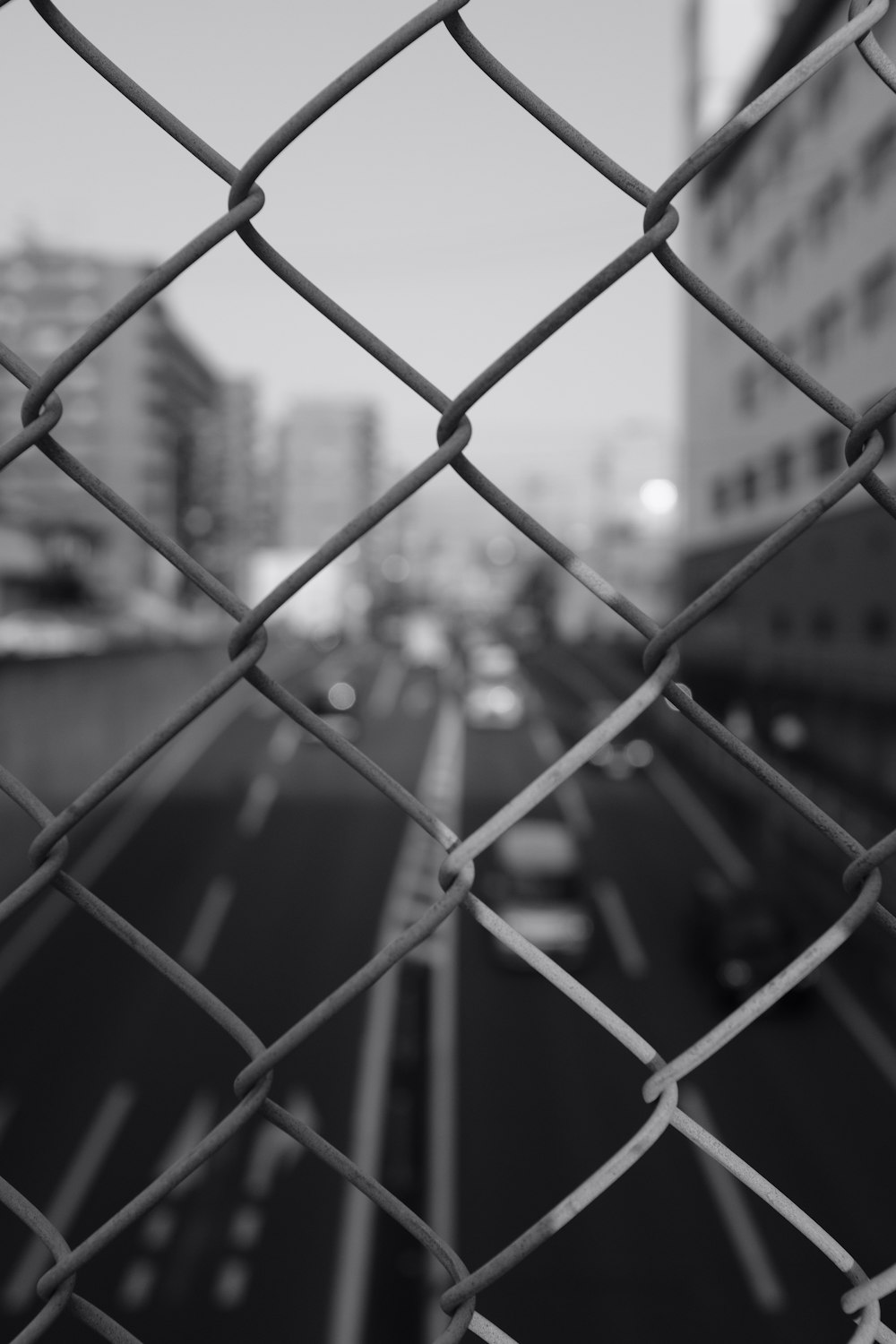 grayscale cyclone fence