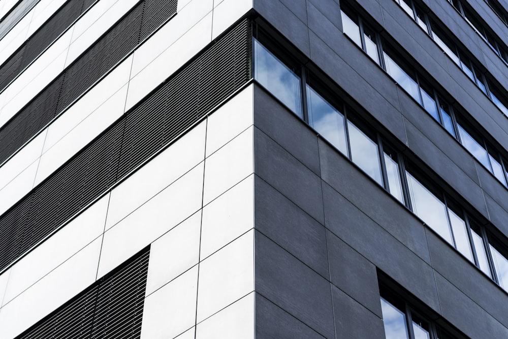 a very tall building with some windows next to it