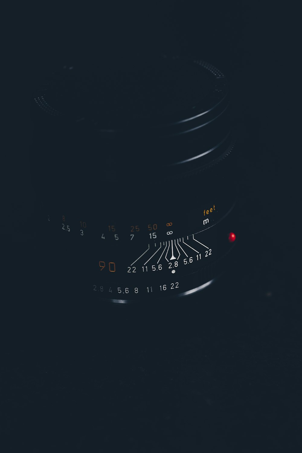 a close up of a speedometer in the dark