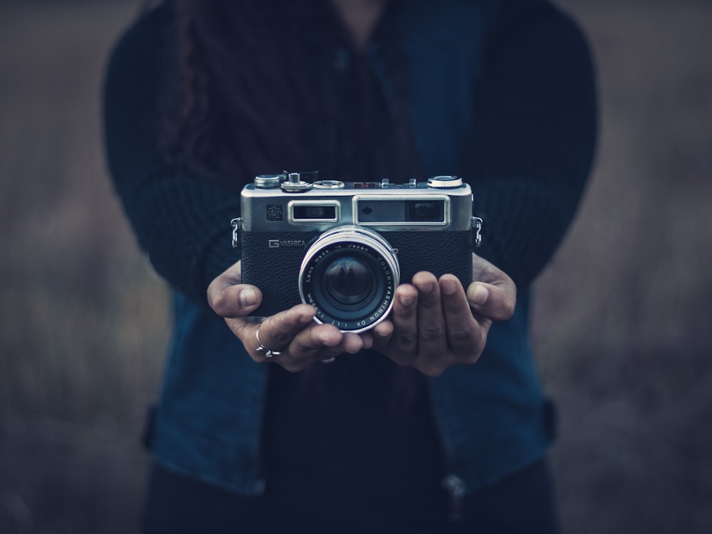 camera on the hands of a woman