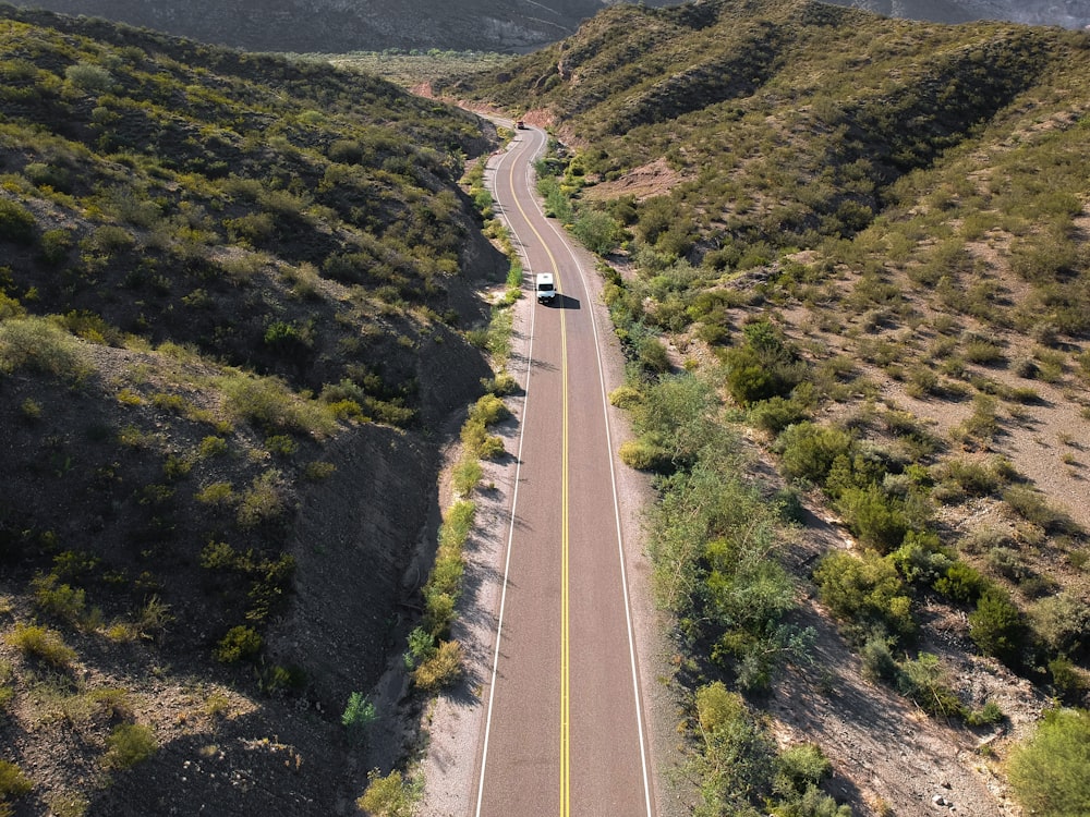 aerial-view photo of white car on road