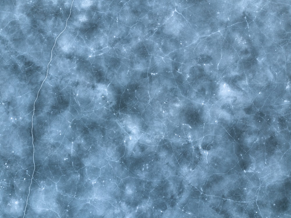ein blau-weißer strukturierter Hintergrund mit kleinen Sternen